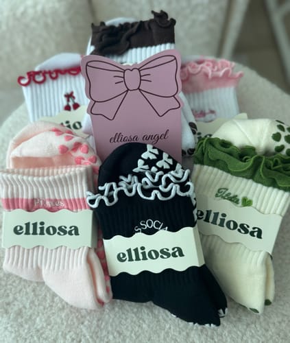 Reviewer's photo of the Bestsellers Bundle, a cute set of colorful Pilates socks with ruffled tops.