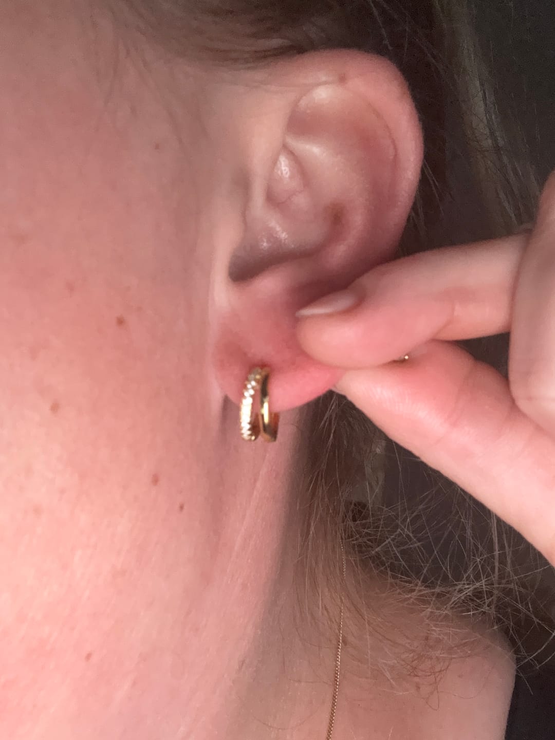 Customer photo review of Double Zirconia Huggie Hoop Earrings