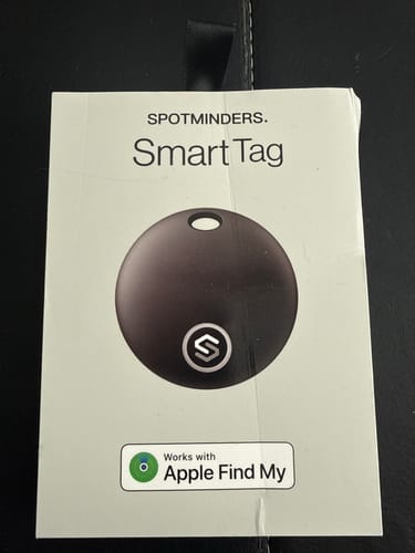 Customer's photo of the box for the SmartTag, showing the black circular tracker and Apple Find My logo.
