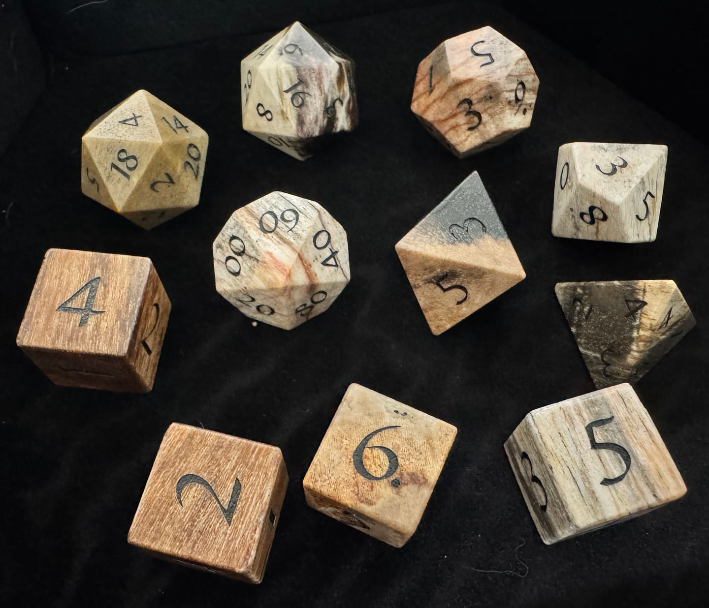 Customer photo review of URWizards D&D Petrified Wood Gemstone Engraved Dice Set(Limited edition)