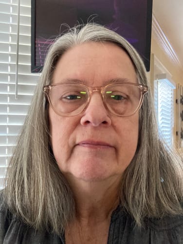 Reviewer's close-up selfie showing their skin in a review for Grass Fed Tallow & Honey Balm.