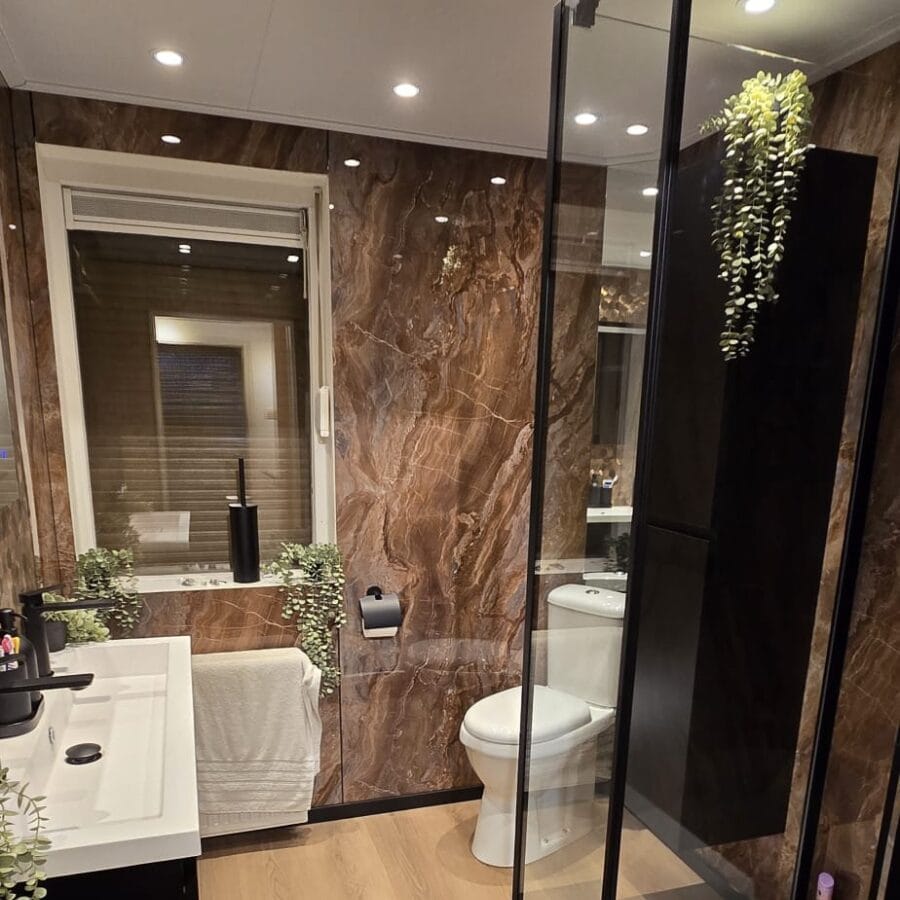 Customer photo review of Plaque Mural PVC Imitation Marbre – Onyx Cuivré Royal 260 x 120 CM