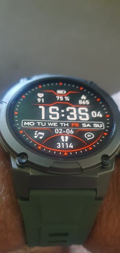 Customer's close-up of the rugged, dark green Gard Pro Ultra 3 smartwatch on their wrist, showing the active display.
