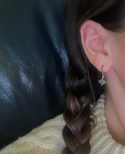 Customer photo review of Cosima Blue Gold Star Huggie Earrings