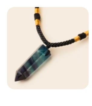 Reviewer's close-up of their Natural Fluorite Necklace, showing the pointed, multi-colored crystal pendant.