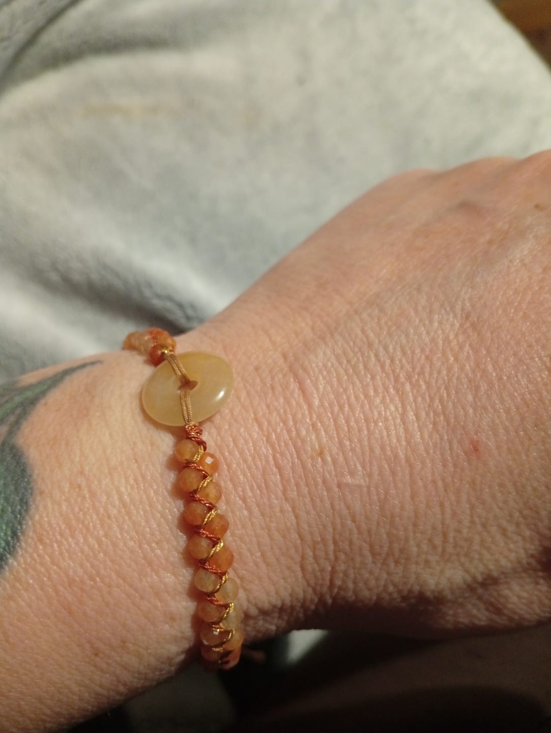 Customer photo review of Orange Agate Circle Charm Adjustable Bracelet – Symbol of Creativity & Balance