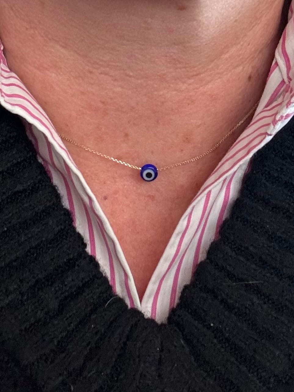Customer photo review of MYKONOS EVIL EYE BLUE NECKLACE