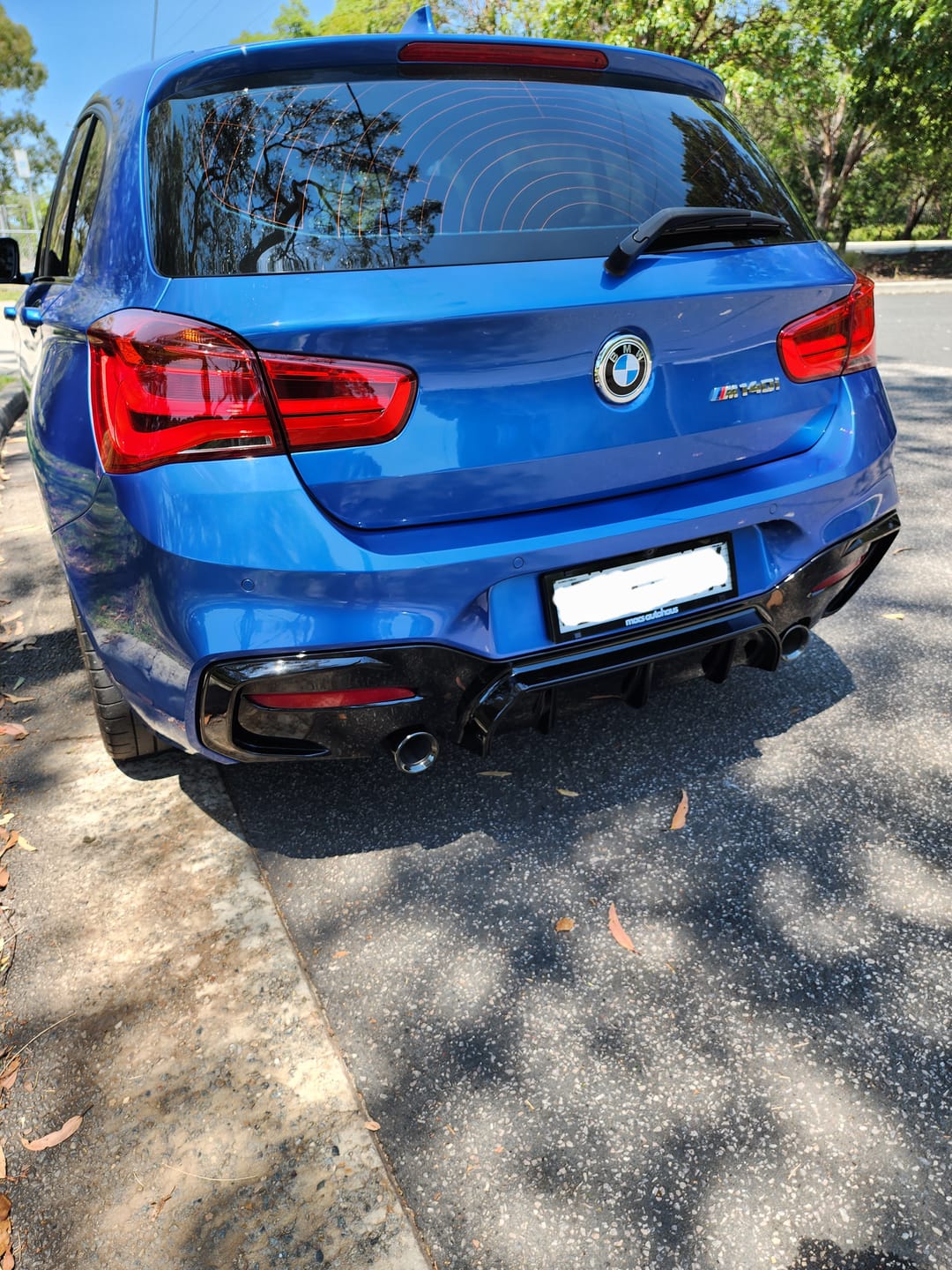 Customer photo review of ABS Glossy Black Rear Bumper Diffuser for BMW 1 Series【F20 M140 135i 128i 125i 120 118 M Sport】【2015-2019】LCI/LCI-2【TWIN】