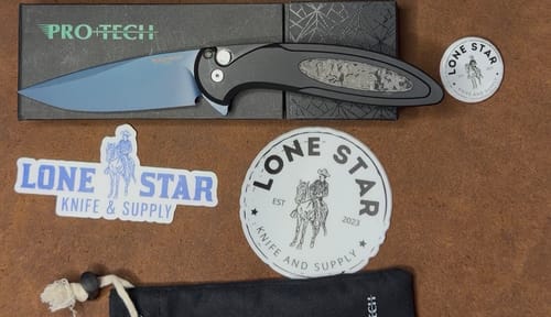 Customer photo review of Pro-Tech Cambria 2 Denim PVD MagnaCut Automatic Knife, 3.5 inch Blade, Black Aluminum with TechnoCarbo Inlay, Abalone Button, Made in USA (CF2103-LTD DENIM TC)