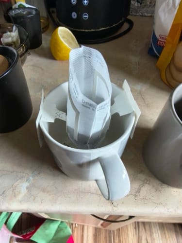 Customer photo review of Bolsas de filtro de café desechables, paquete de papel de café por goteo, portátil, colgante, accesorios de café expreso, herramienta de té, 50/100 Uds.