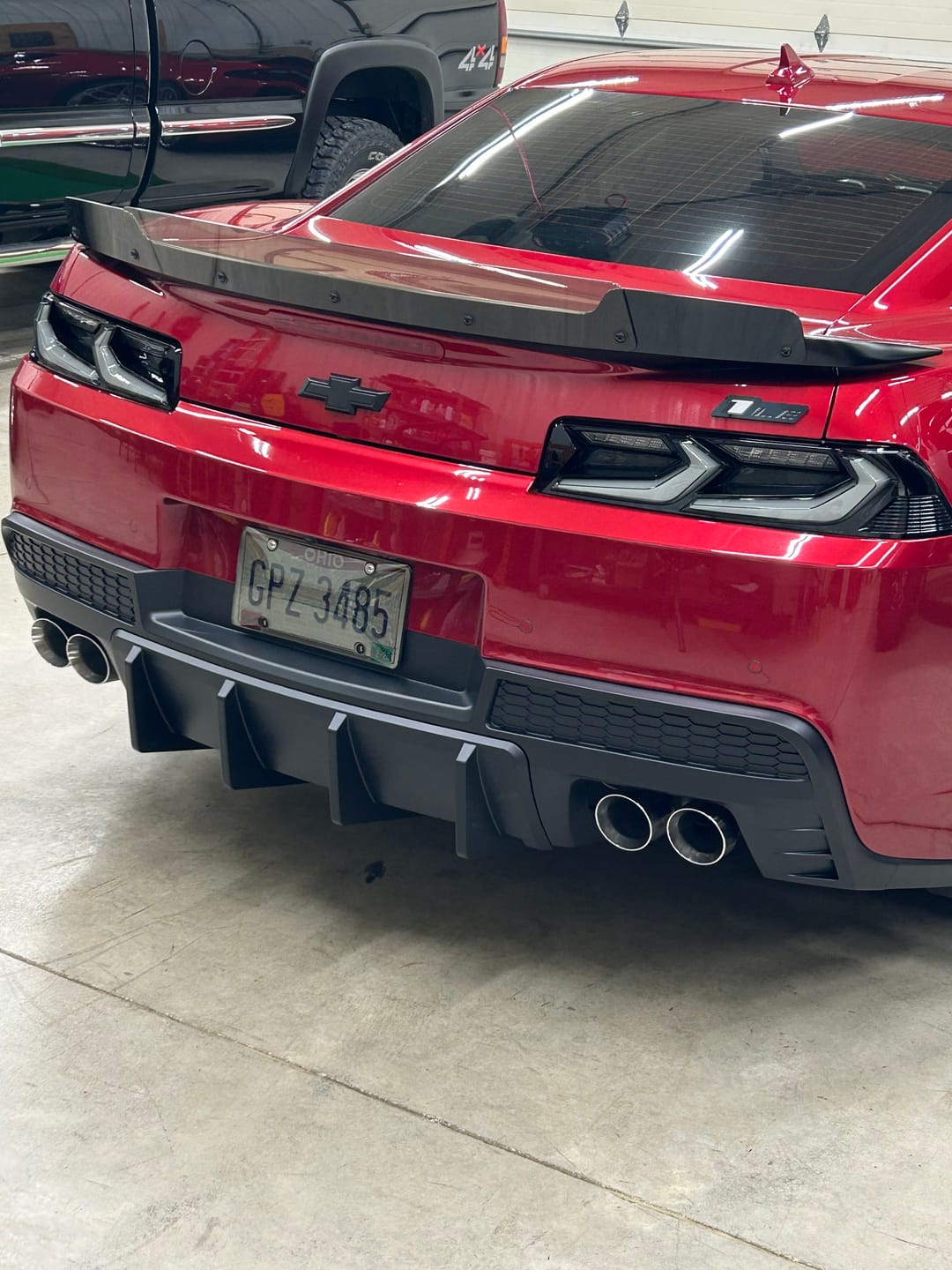 Customer photo review of 2014-2015 Chevy Camaro Evo Style Shark Fins Rear Diffuser Quad/Single Tips