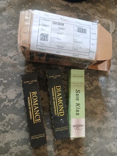 Customer's Diamond Natural Body Mist box next to other fragrances from their order.