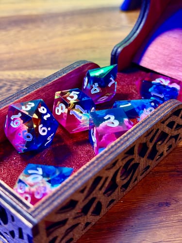 Customer photo review of Starlit Rift Resin DND Dice Set