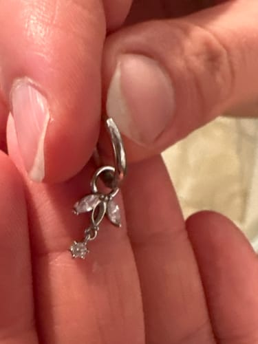 Customer photo review of Simple Lotus Huggie Ohrringe