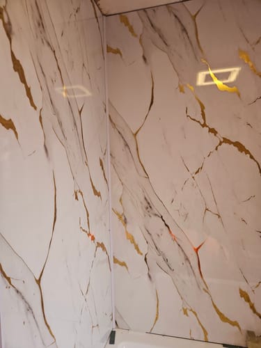 Customer photo review of Premium White Gold Marble Gloss Shower Wall Panel – 1M x 2.4M