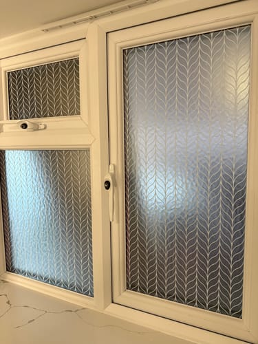 Customer photo review of Garbo Frosted Window Privacy Panel