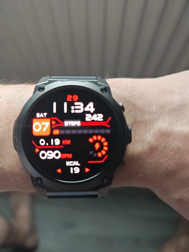Customer's black Gard Pro Ultra 3 watch on their wrist, displaying a digital face with fitness tracking data in red and white.
