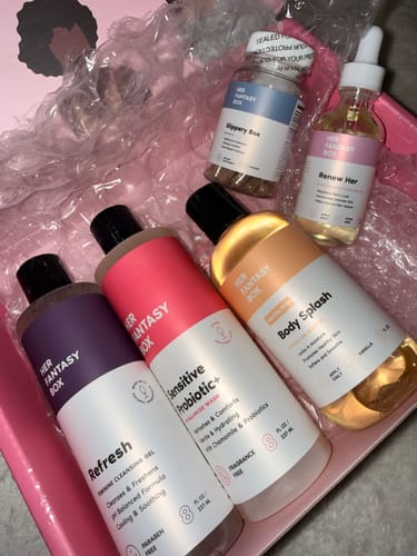 Customer's Before Intimacy Kit with all five products displayed inside a bright pink box with bubble wrap.