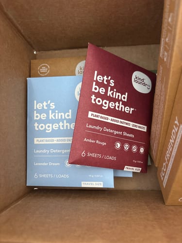 Reviewer's Scent Discovery Detergent Sheets, showing colorful travel-size packs inside a cardboard box.