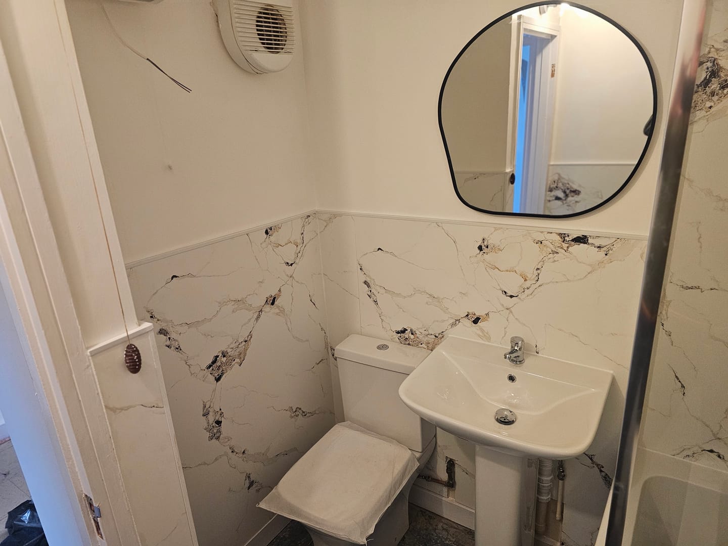 Customer photo review of 10mm Oro Gold Marble Ultra Matt Shower Panel 1M x 2.4M