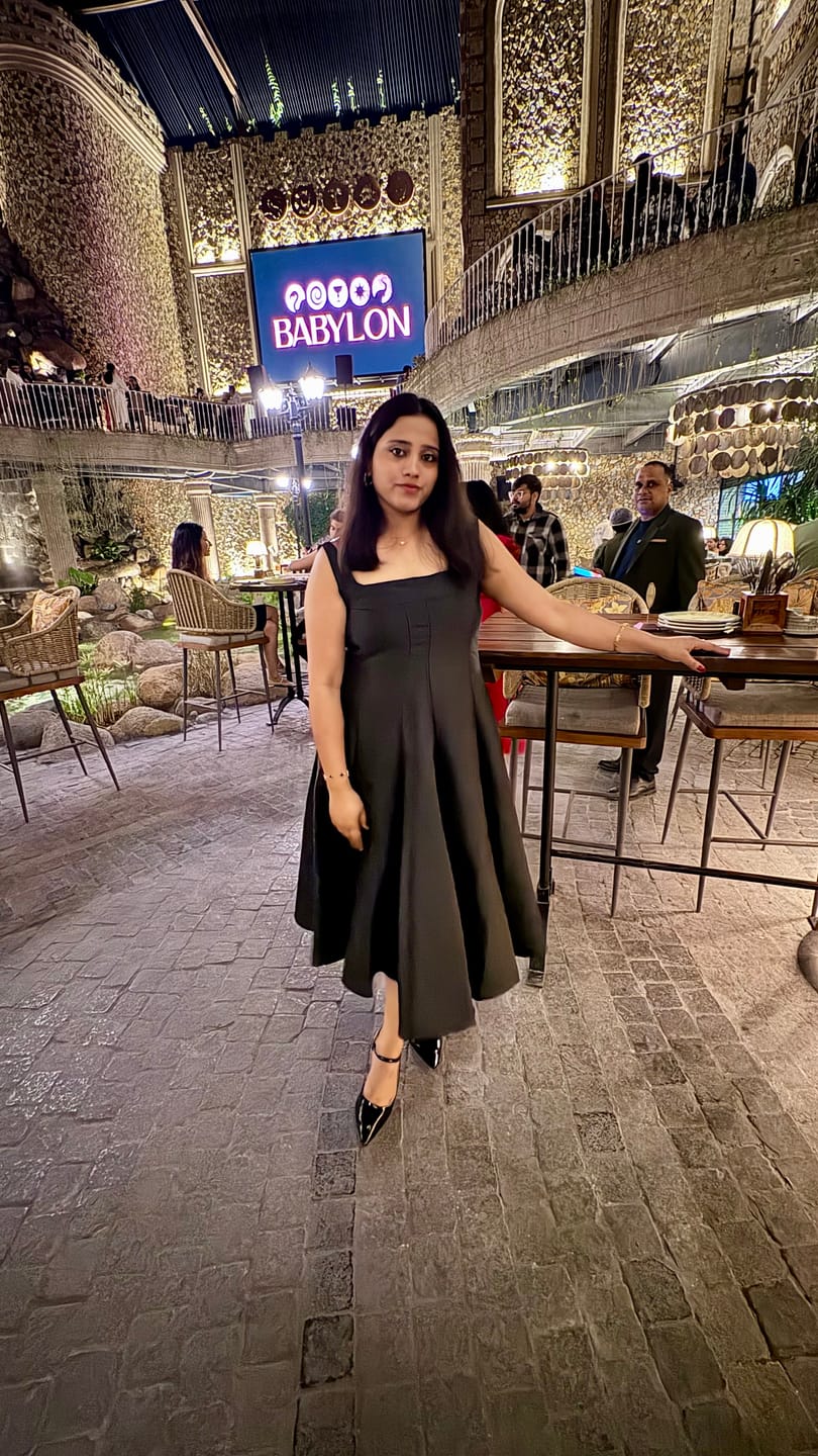 Customer photo review of Rigata Holiday Statement Maxi Dress in Black