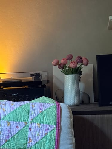 Customer photo review of Plum real touch tulips (3 stems)