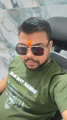 Reviewer taking a close-up selfie while wearing the Co-Pilot Golden Wayfarer Sunglasses.