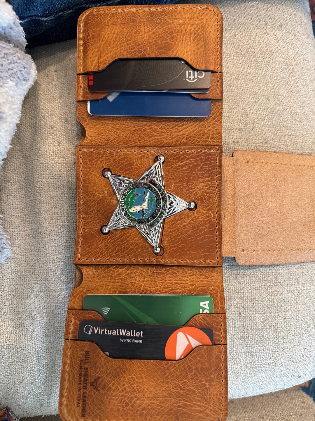 Customer photo review of Badge Trifold Wallet