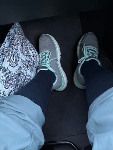 Customer wearing their dark Performance Eucalyptus Compression Socks with sneakers.