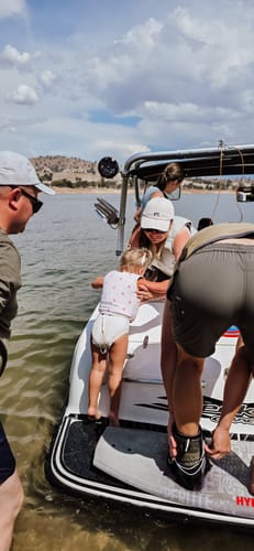 Customer photo review of SUNNYLIFE SWIM VEST | STRAWBERRY SUNSHINE