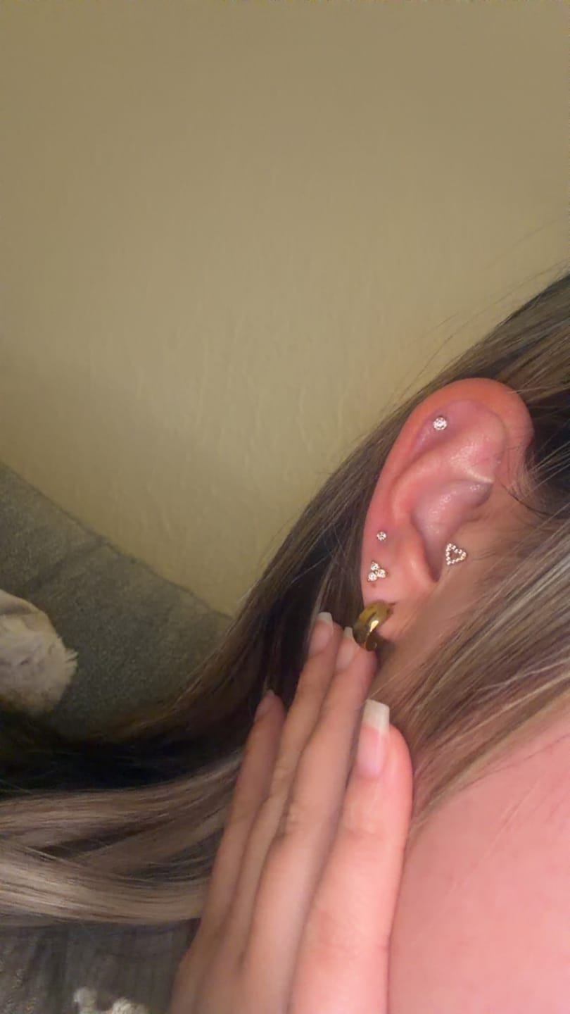 Customer photo review of Heart Piercing | Titan