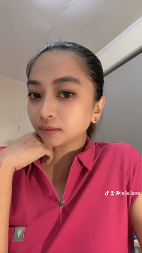 Customer photo review of Zip-Up Polo MoveTech® Scrub Top - Women / Orchid Crush