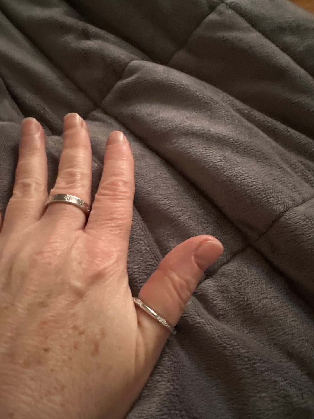 Customer photo review of The Petite Crown Lace Moissanite Eternity Wedding Band Ring