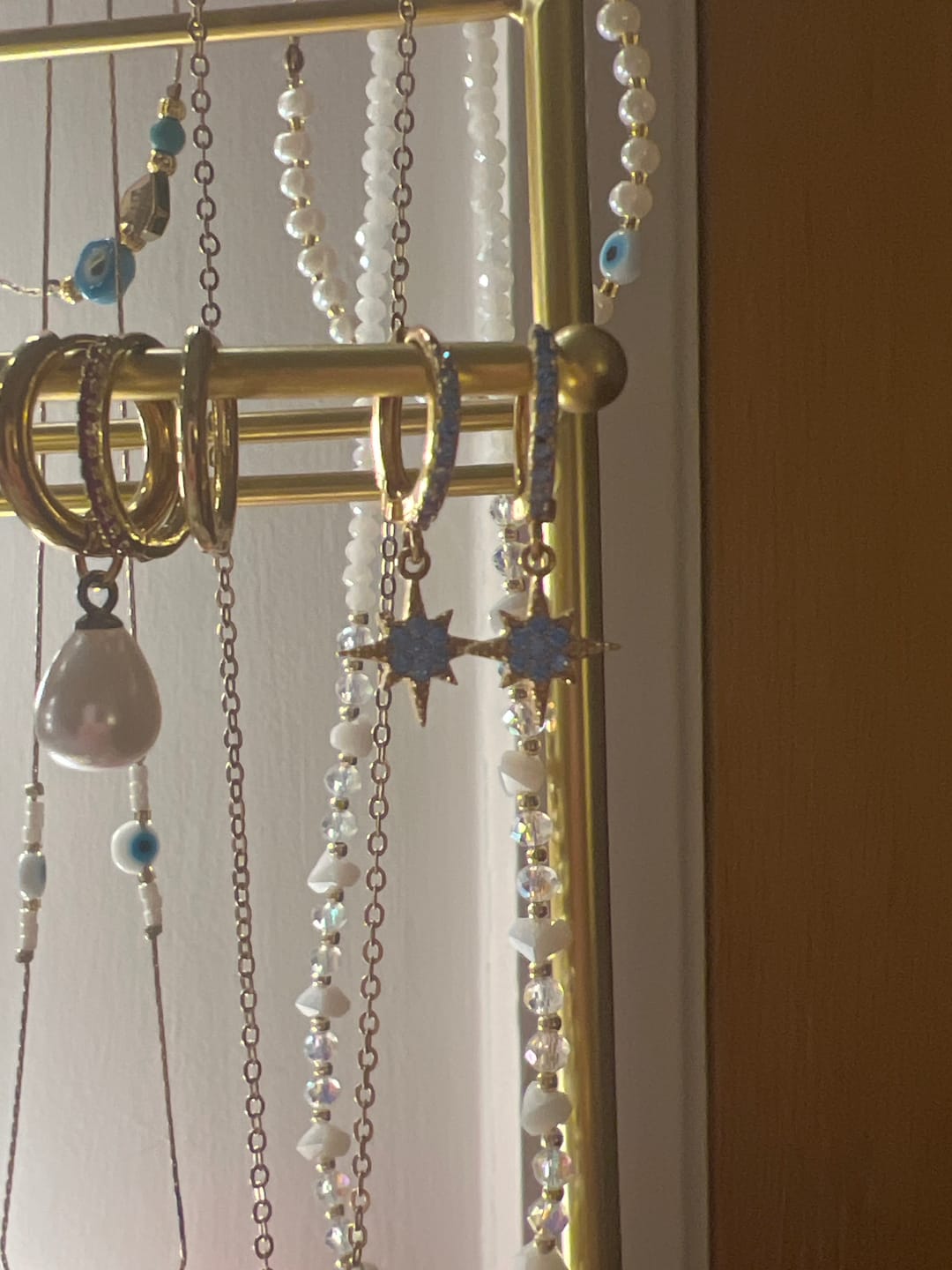 Customer photo review of Cosima Turquoise Gold Star Huggie Earrings