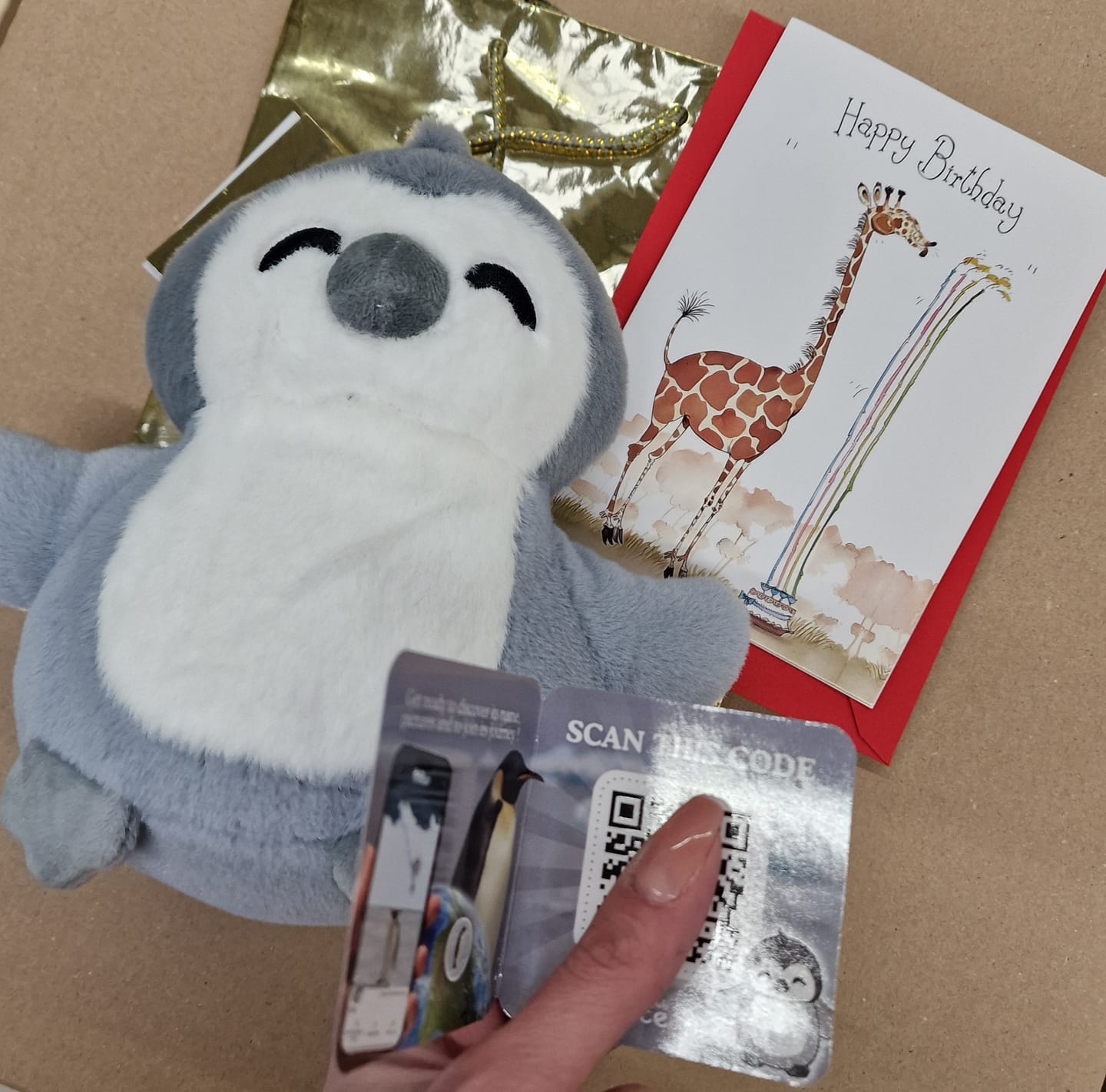 Customer photo review of Polar Bear Adoption Plushie