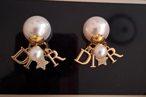 Customer photo review of Elegant Business Pearl & Star Stud Earrings for Women Fashionable Travel Banquet Party Jewelry Accessory
