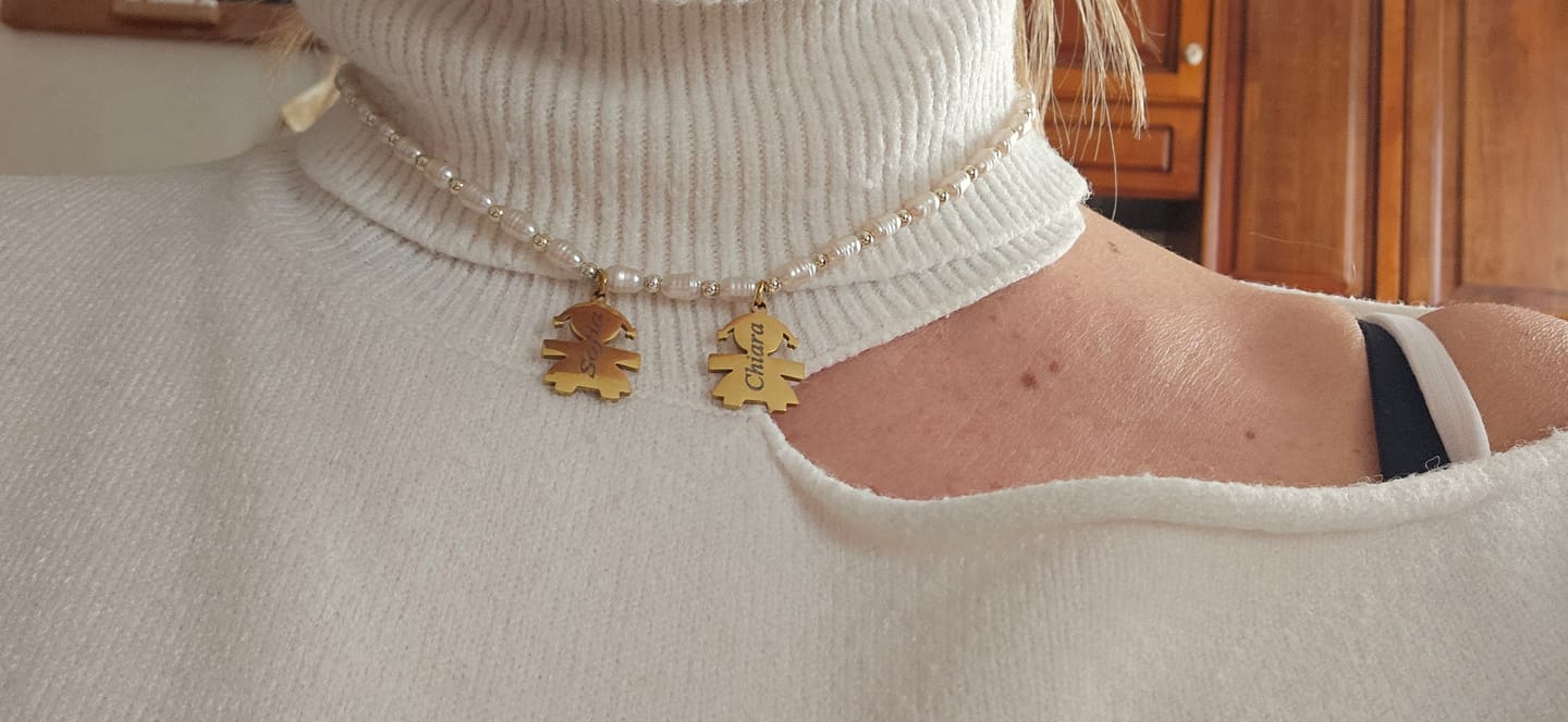 Customer photo review of Girocollo perline con bambini e incisione