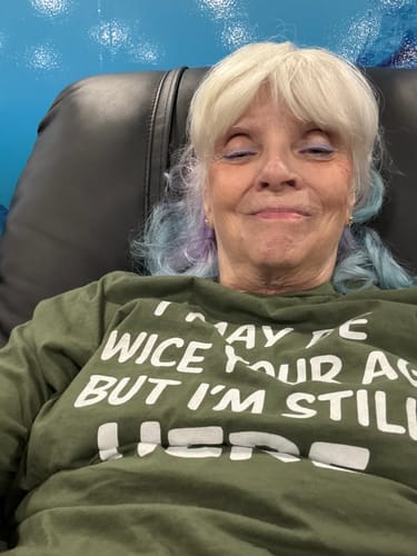 Customer photo review of Still Here T-Shirt