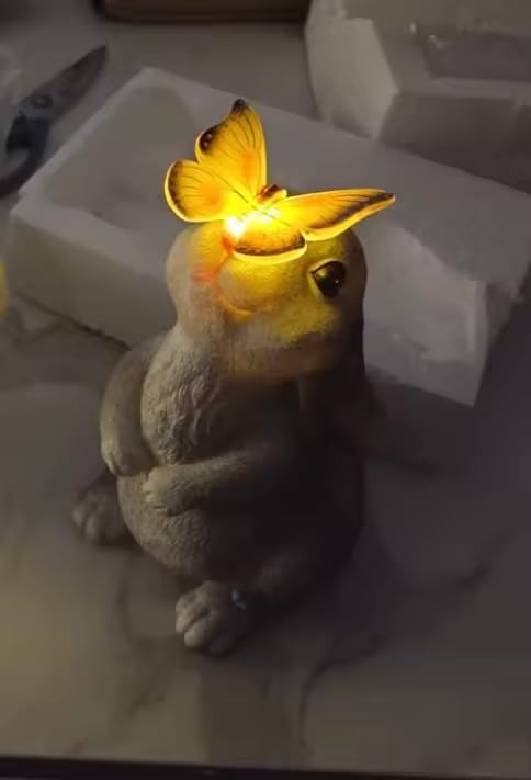 Customer photo review of Solar Bunny Garden Statue – LED Butterfly Resin Decor
