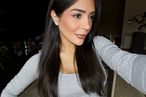 Customer photo review of CLASSICA 6 Carat Round Flawless Four-Prong Martini Stud Earrings White Gold Vermeil with Moissanites