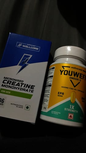 Customer's YouWeFit Omega-3 Fish Oil bottle next to a box of creatine supplements.