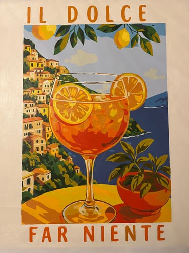Customer's finished 'Aperol in Italy' paint-by-numbers canvas showing a vibrant cocktail against a coastal town backdrop.