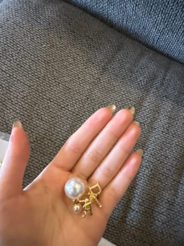 Customer photo review of Elegant Business Pearl & Star Stud Earrings for Women Fashionable Travel Banquet Party Jewelry Accessory