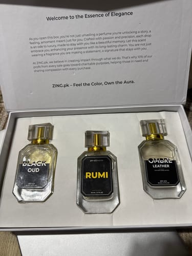 Customer's open OUD Supreme Bundle box, displaying three glass perfume bottles inside.