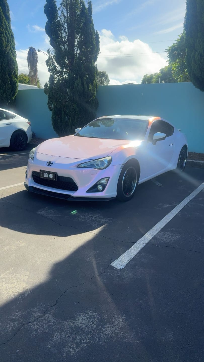 Customer photo review of Candy Metallic Pink White Vinyl Wrap