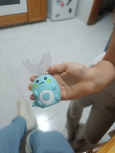 Customer photo review of Children U-shaped Electric Toothbrush 360 Degrees Smart Cartoon Kids silicone Toothbrush Automatic Rechargeable Sonic Toothbrush