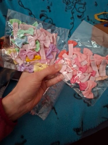 Customer photo review of 30 colored random bow fabric hair clips suitable for daily use as hair accessories