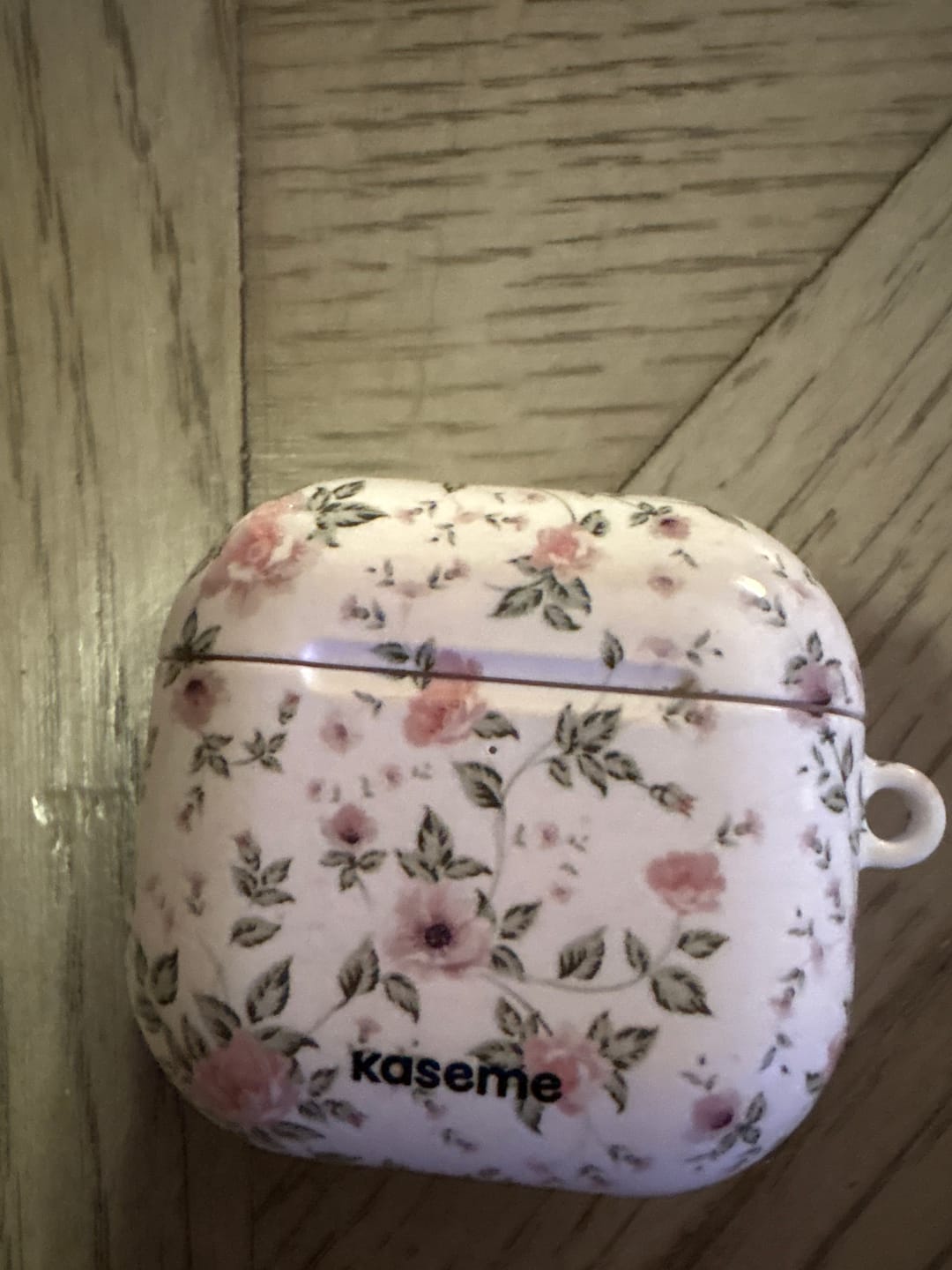 Customer photo review of La Vie en Rose AirPods Case