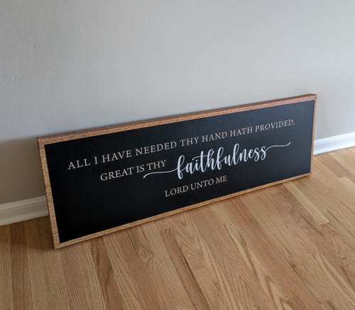 Customer's Custom Rustic Canvas Sign with a Bible verse, leaning against a wall on a wooden floor.