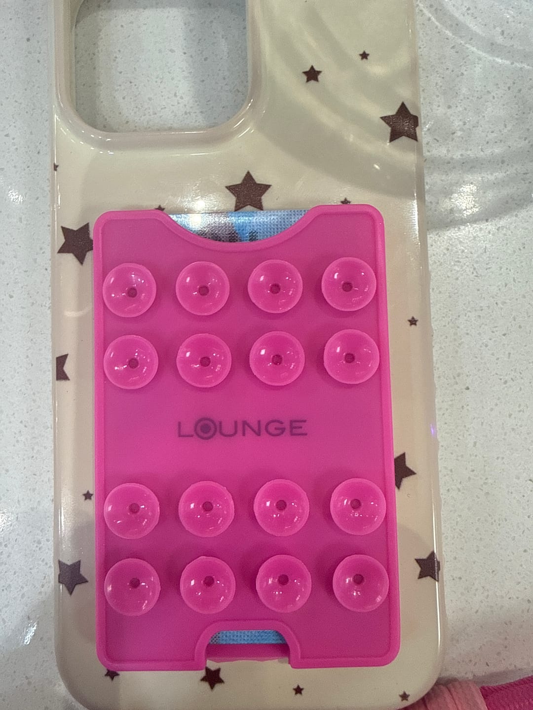 Customer photo review of Tarjetero Celular Adhesivo Ventosas Craft